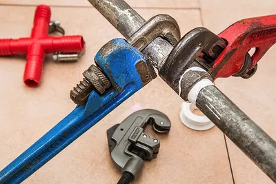 fixing a leaking pipe
